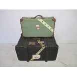A wooden storage trunk, named on top with H.B.Barns Lt CDr R.N (Royal Navy), along with a vintage