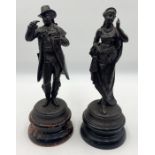 Two spelter figures on wooden bases