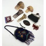 A small collection of antique hair combs, beadwork bag etc