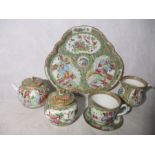 A small collection of Famille Rose tea ware ( two pieces A/F) along with a similar trefoil dish
