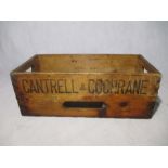 A vintage wooden crate, marked with Cantrell & Cochrane