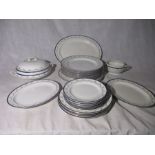 A Booth's part white dinner service with blue rim