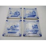 A set of four Delft tin glazed tiles