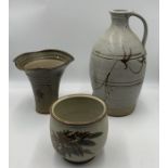 Three pieces of studio pottery including a cider flagon