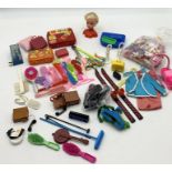 A collection of mainly Sindy accessories
