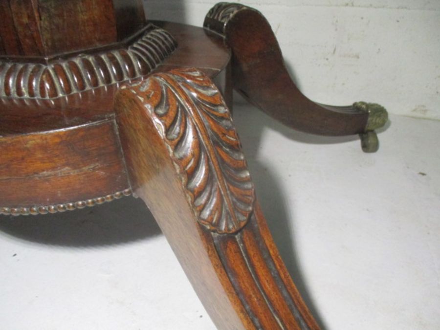 A Victorian rosewood veneered tip up table on quatrefoil legs. - Image 4 of 16