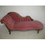 A Queen Anne style chaise lounge.