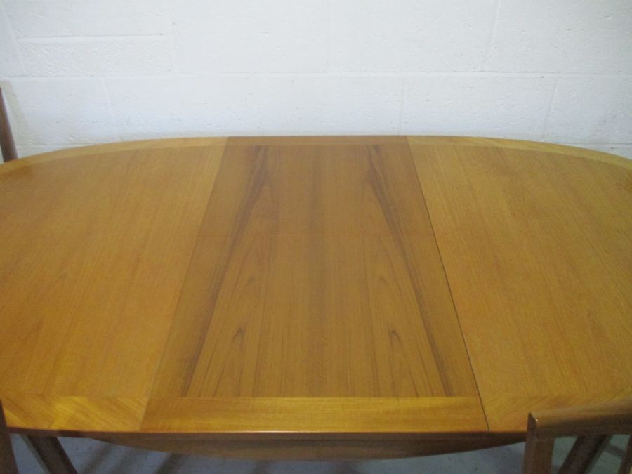A Nathan extending dining table, along with six matching chairs including two carvers. - Image 5 of 16
