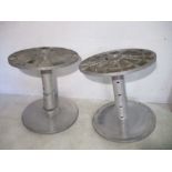 A pair of large aluminium industrial spools (marked with T.Ashworth Burnley) from Axminster Carpets.