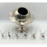 An aluminium Saturn ring ice bucket with six shot glasses