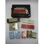 A Tom Clancy's Rainbow Six Vegas 2 poker set, along with three vintage sets of Dominoes and