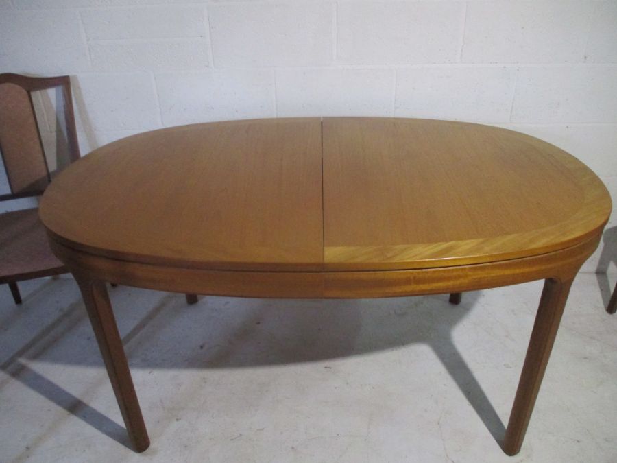 A Nathan extending dining table, along with six matching chairs including two carvers. - Image 10 of 16