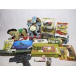 A collection of various toys including a small selection of boxed die-cast vehicles, toy guns, small