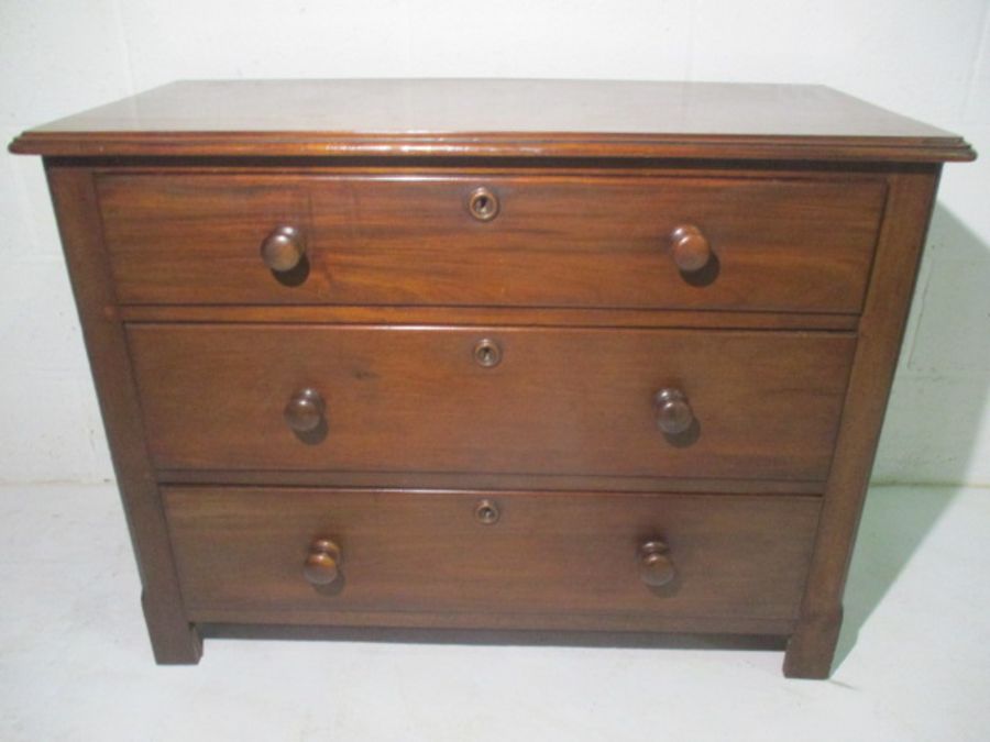 A small Victorian mahogany chest of three drawers.