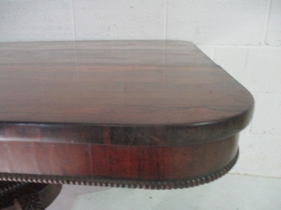 A Victorian rosewood veneered tip up table on quatrefoil legs. - Image 6 of 16