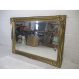 A large gilt framed mirror, overall size 106cm x 75cm