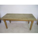 A large pine farmhouse table