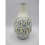 A Poole Pottery Freeform carafe vase - approx. height 30cm, numbered 691 - possibly decorated in a