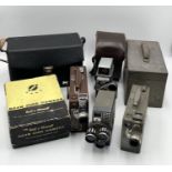 A collection of vintage cameras including two Cine-Kodak movie makers in original cases with