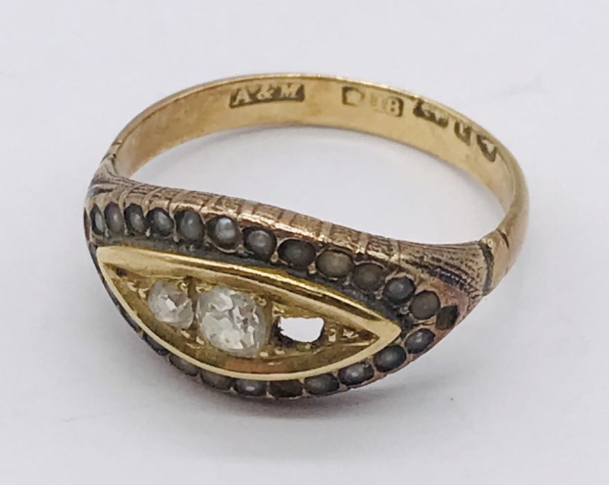 An 18ct gold boat ring set with diamonds and seed pearls - 1 stone missing along with 1 seed