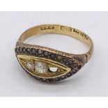 An 18ct gold boat ring set with diamonds and seed pearls - 1 stone missing along with 1 seed