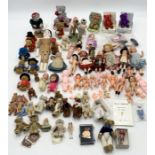 A collection of small and miniature dolls and Teddies including a German bisque doll and others.