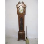A modern Tempus Fuoil long case clock