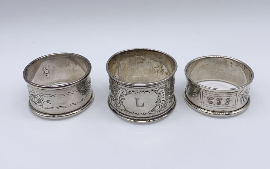 A collection of 7 hallmarked silver napkin rings along with an Australian silver plated version - Image 3 of 5