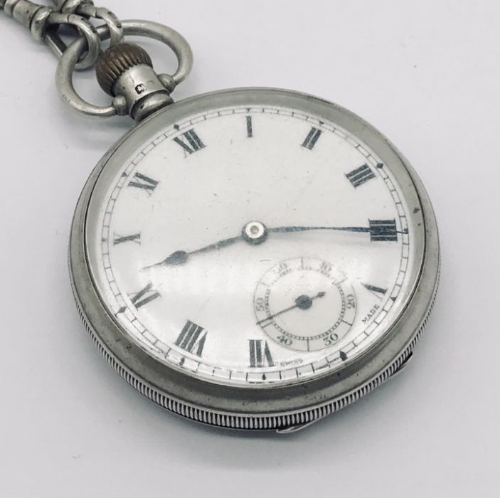 A hallmarked silver pocket watch with subsidiary second dial on a hallmarked silver Albert - Image 2 of 3