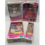 A small collection of four boxed Sindy dolls