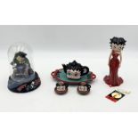 A small collection of Betty Boop memorabilia including Miniature Tea Set, Figurine etc.