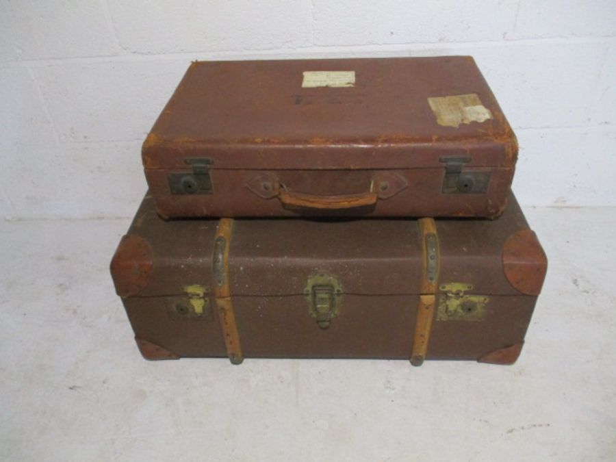 Two vintage luggage trunks