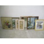 A collection of pictures and a mirror including a still life watercolour