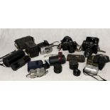 A collection of vintage cameras and lenses including 2 x Zenith, Sigma etc.