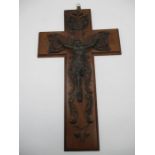 A crucifix with fretwork design, bearing the inscription INRI. 50cm x 30cm