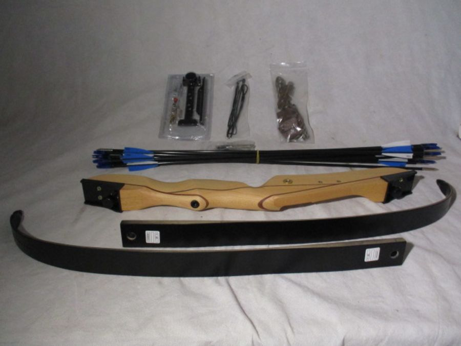 A new (no box) recurve archery bow with arrows