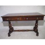 An early Victorian mahogany hall table with two drawers and turned legs