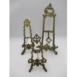 Three ornate brass table easels - tallest 39cm, shortest 23cm