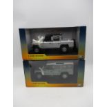 Two boxed Land Rover die-cast models (1:18 Scale) including the Land Rover Defender's 110 Station