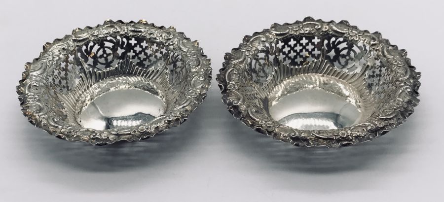 A pair of hallmarked silver sweetmeat dishes