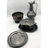 A collection of pewter and other items including large jug, plate with Fleur de Lis and crown