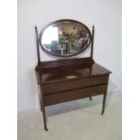 An Edwardian dressing table labelled Ralph Johnson Furniture Maker