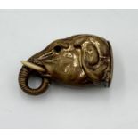 An early 20th Century brass elephant head vesta case