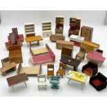A collection of mid-century style dolls house furniture