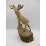 A wooden hand carved sculpture of a moose by Albert Demers (Canadian Folk Sculptor) - approx.