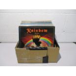 A collection of 12" vinyl records including Rainbow, The Who, Carole King, Jimi Hendrix, The Moody