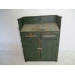 An industrial green painted clerks desk/workstation