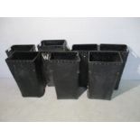 A collection of eight black industrial bins - some A/F