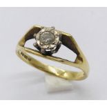 An 18ct gold ring with an illusion set diamond, weight 3.1g