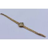 A ladies 9ct gold Bernex watch with 9ct gold strap, total weight 13.3g